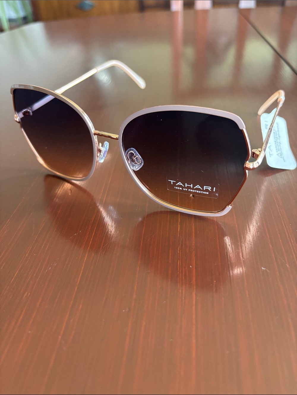 Tahari 100% UV protect,rose gold metal frame/arms,gradient brown lens